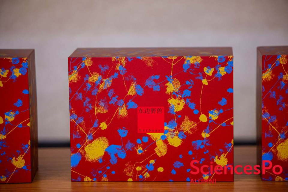 A red box with blue and yellow flowers on it
AI-generated content may be incorrect.